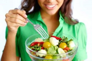 woman eating salad 