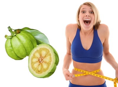 garcinia-cambogia woman checking waist
