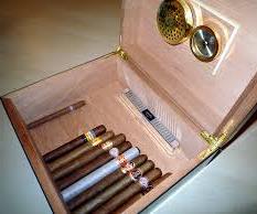 open humidor with cigar